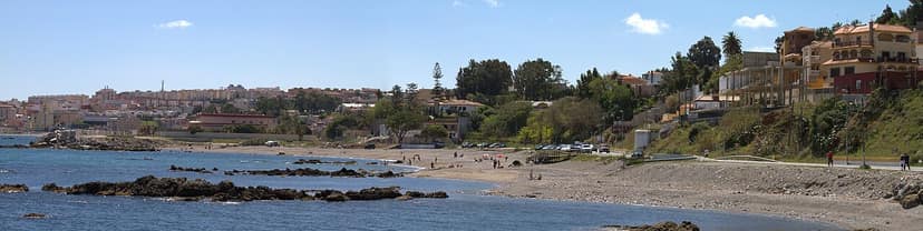 Improvised migrant camp at Trampolín beach in Ceuta
