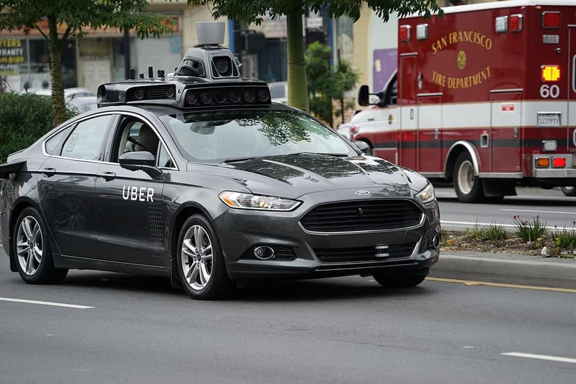 Photo d'archive: Des conducteurs d'Uber portent plainte en action collective contre les algorithmes d'IA